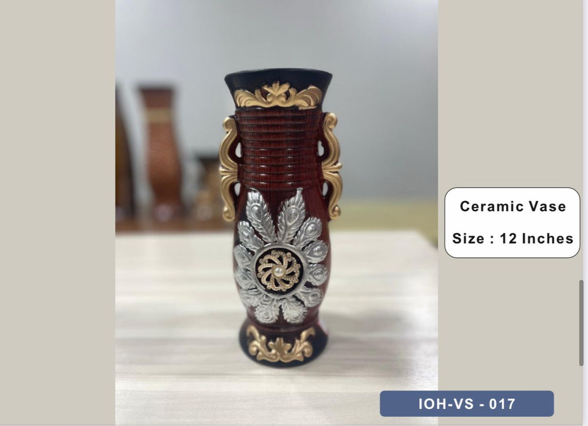 Ornate Ceramic Vase with Silver Floral Detailing and Gold Handles