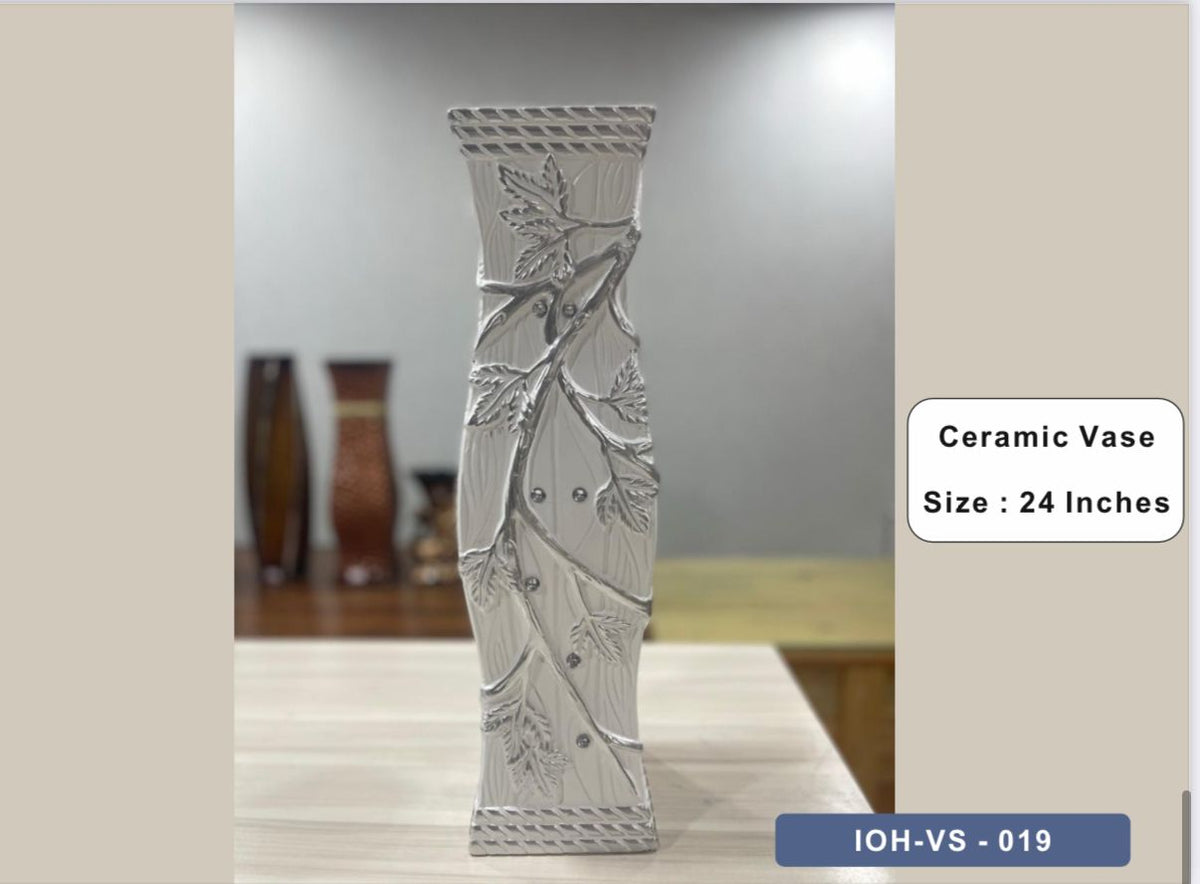 Elegant White Ceramic Vase with Embossed Leaf Motif